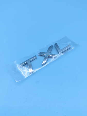 Эмблема крышки багажника TXL Exeed TXL 609000583AA