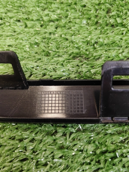 Молдинг переднего бампера нижний черный хром Geely Atlas рестайлинг 6010219400B03