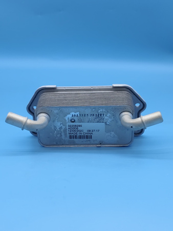 Радиатор масляный Geely Coolray Atlas 1056021400