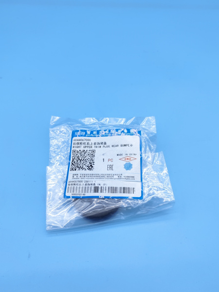 Заглушка заднего бампера правая круглая Geely Atlas Pro 6044067000