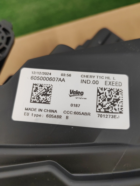 Фара левая Exeed LX 605000607AA