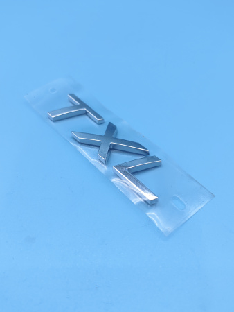 Эмблема крышки багажника TXL Exeed TXL 609000583AA