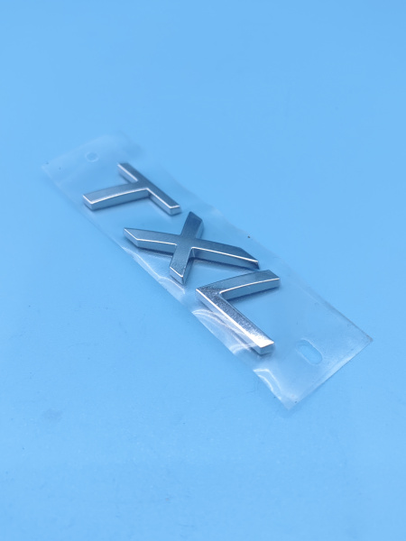 Эмблема крышки багажника TXL Exeed TXL 609000583AA