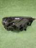 Фара левая Geely Monjaro 7051047300