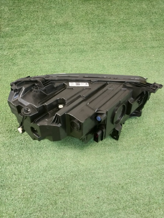 Фара левая Geely Monjaro 7051047300